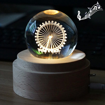 Glowing crystal ball music box night light on round wooden base, LED light effect.