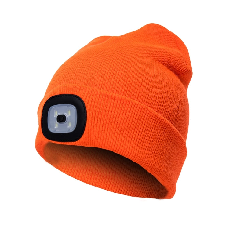 Unisex orange knit winter beanie hat with 4-LED light panel on front and button battery