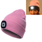 Unisex pink knit winter beanie hat with 4-LED light panel and button battery