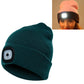 Unisex teal knit winter beanie hat with 4-LED light panel and button battery
