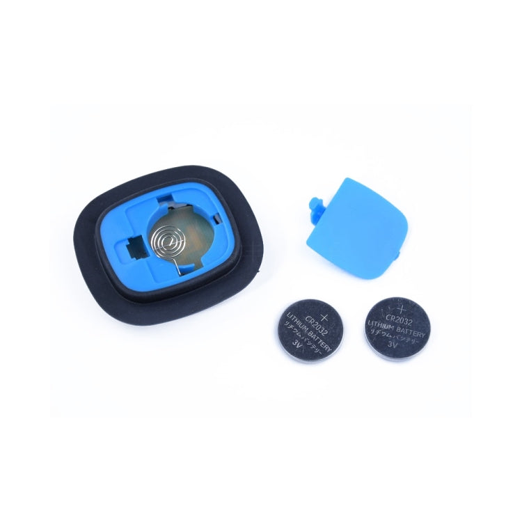 Unisex LED light beanie module with button batteries and cover, shown unpacked