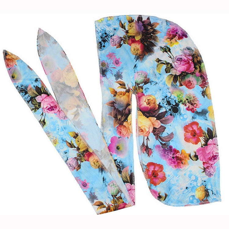 Printed headscarf cap ties, blue base with floral bouquet pattern, elastic stretch