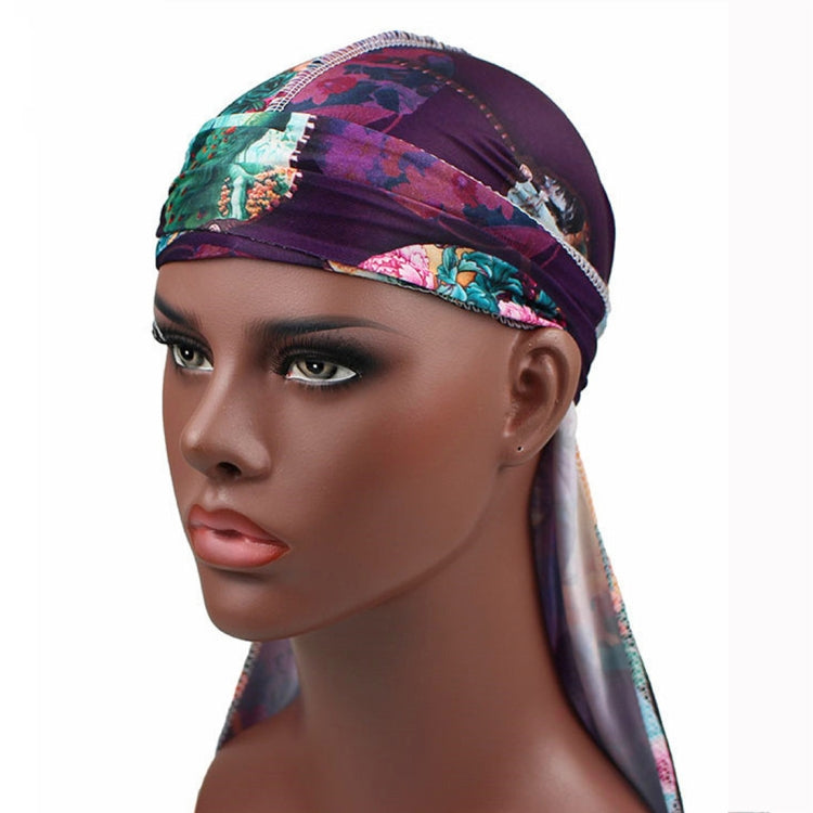 Floral long-tailed pirate hat, purple with teal and pink band; long scarf tail drape