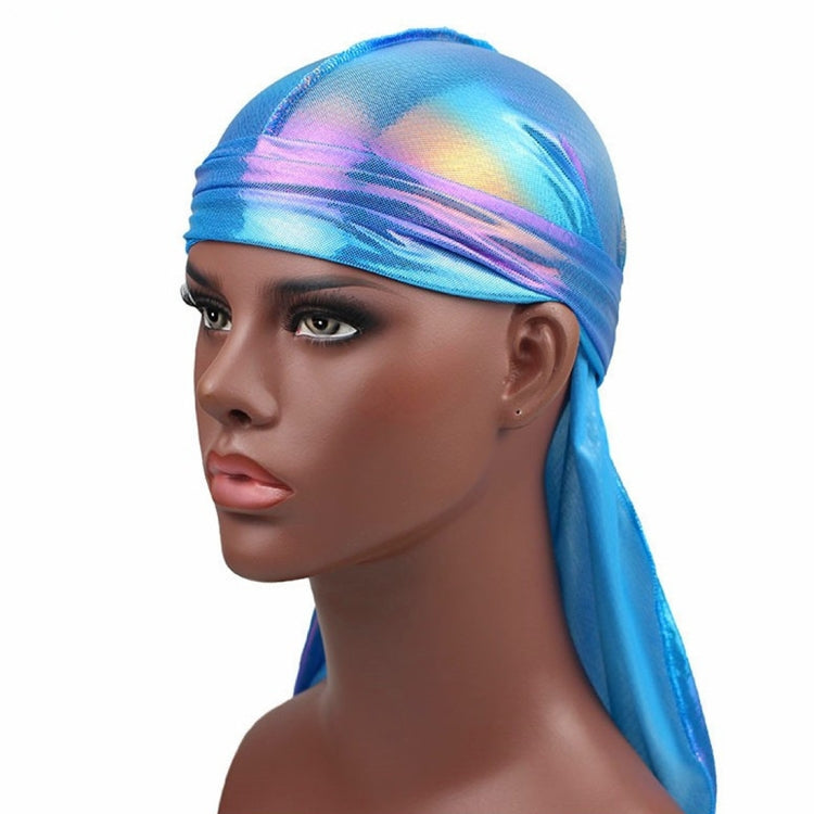 Iridescent pirate headscarf hat worn on head, with long trailing tail on the side