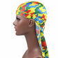 Camouflage pirate turban cap with long side tail and red/blue/green camo print, side view