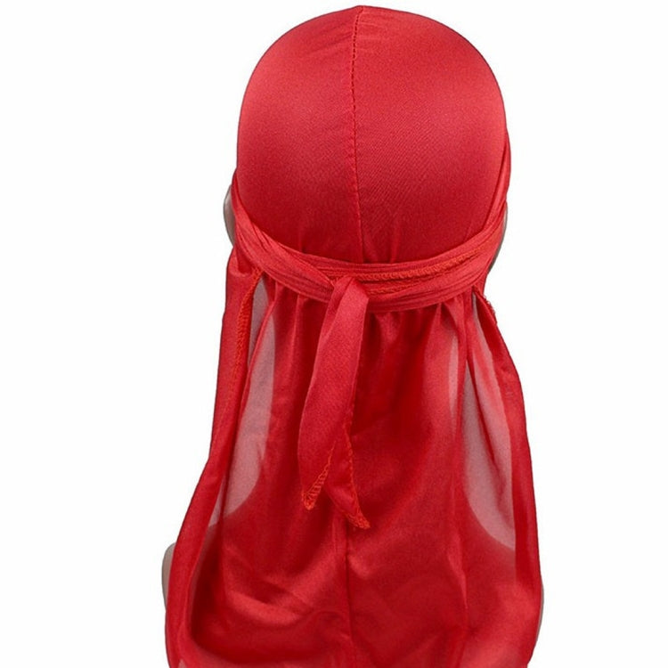 Red long-tailed headscarf hat with elastic band and gathered tied back