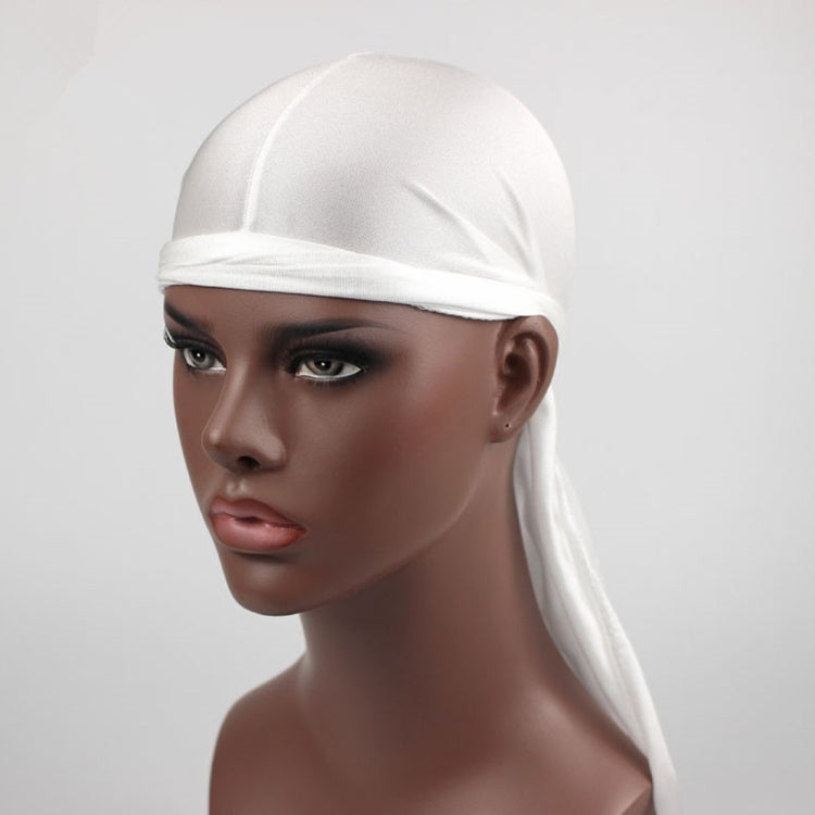White long-tailed headscarf hat on a mannequin with elastic band and tied back tails