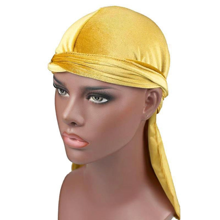 Yellow velvet turban cap with front band wrap and long side tie tail