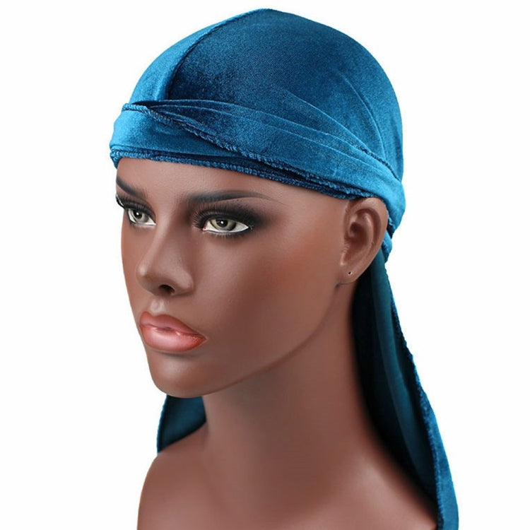 Blue velvet turban cap with front wrap band and long side tail