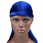 Royal blue velvet turban cap with wrap band and long trailing drape
