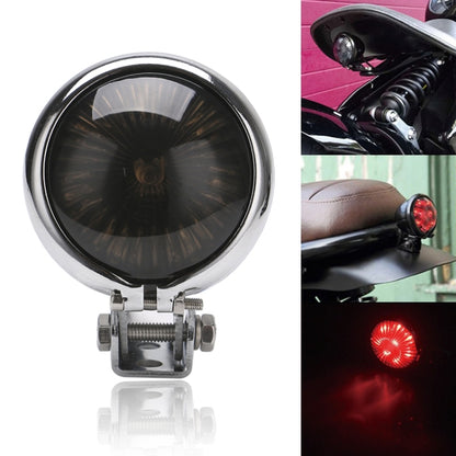 Motorcycle tail light, round smoked lens with chrome mounting bracket and screws