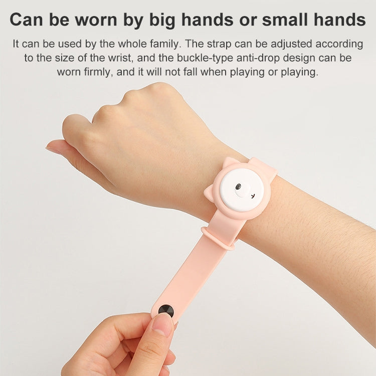 Pink children’s mosquito repellent wristband on a child’s arm, adjustable strap