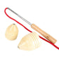 Close-up wooden spinning top with metal rod, red cord, and cone-shaped wooden pieces