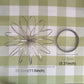 Stainless steel spring bracelet fidget toy with stacked circular wire rings, laid out flat