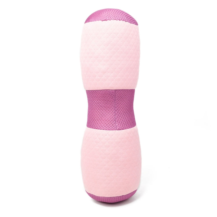 Pink cylindrical lumbar pillow with purple band and rounded end cap
