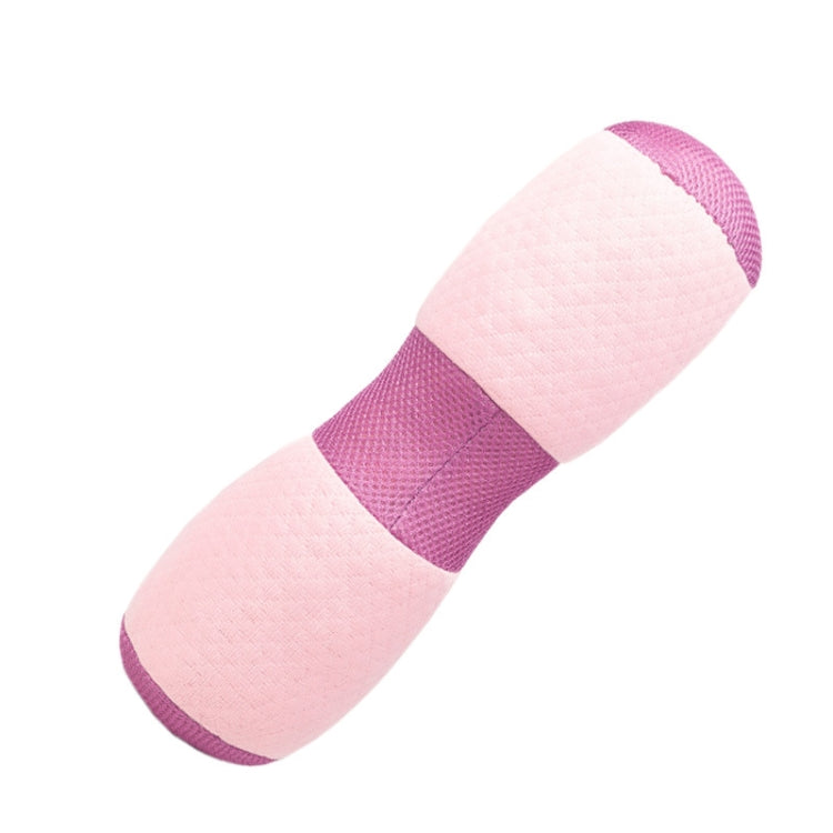 Pink yoga support bolster with purple center strap and rounded ends