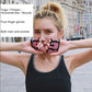 Pink half-finger yoga gloves held toward camera, grippy dotted palm pads visible.