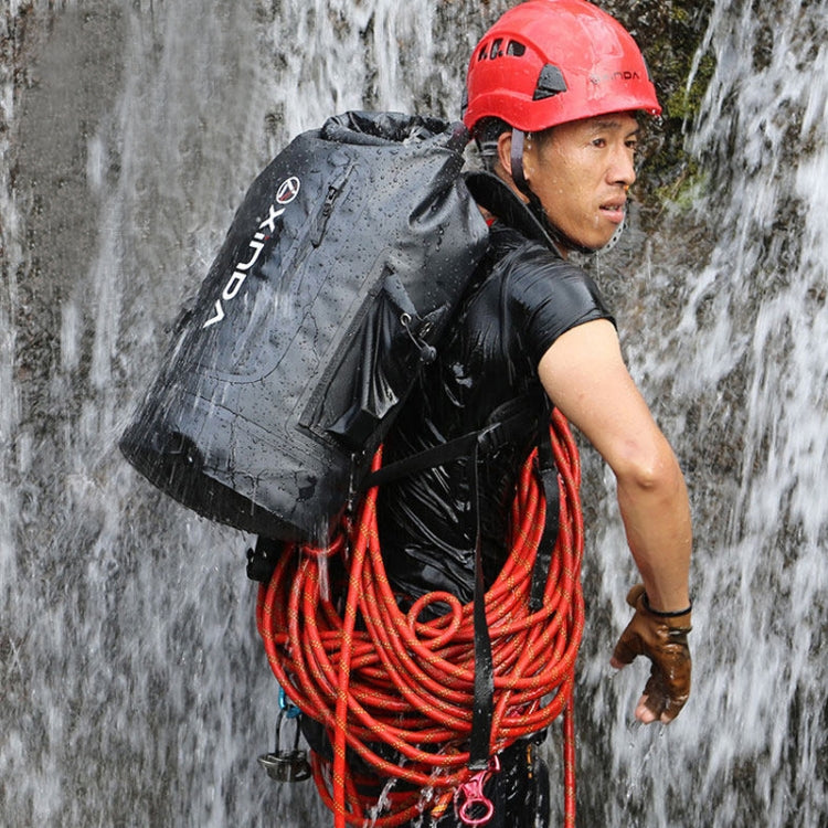 Waterproof 20L shoulder bag in dark gray/black with front pocket and climbing straps