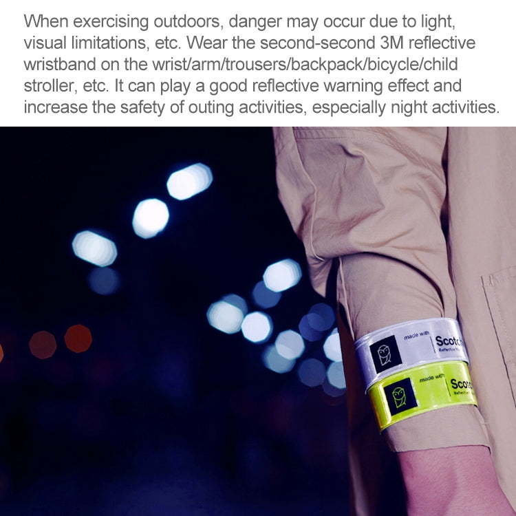 Reflective wristband on forearm, neon yellow band with silver reflective strip