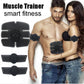 EMS electrode muscle stimulator kit worn by a man and a woman on abdomen and arms