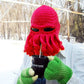 Red octopus knit beanie with face mask and long curled tentacle fringe