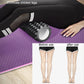 Black EVA crescent massage roller on exercise mat for thigh and calf relief