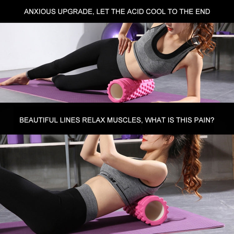 Pink EVA crescent massage roller with diamond-bump texture for muscle stretching