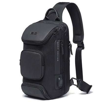 Black chest bag with top carry handle, front flap pocket, and adjustable shoulder strap