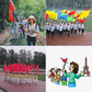 Telescopic teaching stick with red rubber grip handle, shown outdoors with flags