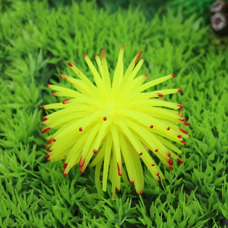 Yellow-green TPR sea urchin ball aquarium decoration with red-tipped spiky tentacles