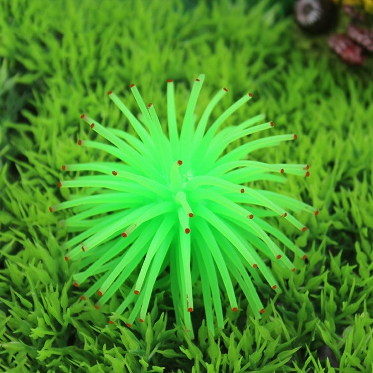 Green spiky sea urchin ball coral decoration with pointy arms, aquarium ornament.