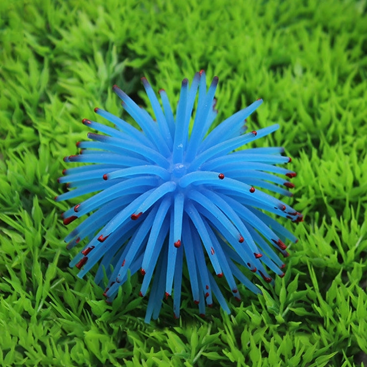 Blue spiky sea urchin ball coral decoration with pointy arms, aquarium ornament.