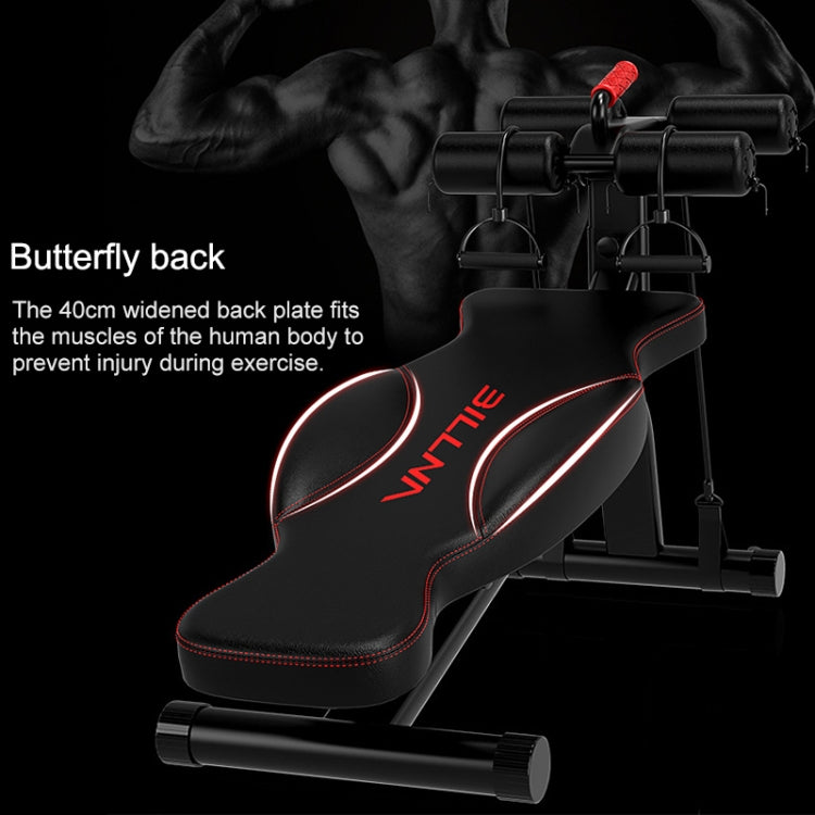 Black supine board abdominal curl bench with red-stitch padded back and roller handles