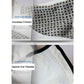 Close-up of white glove palm texture with black trim and elastic wrist fabric