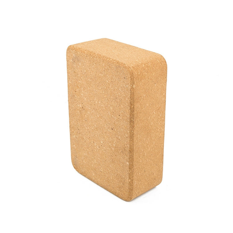 Cork yoga block, upright rectangular brick in tan with textured finish