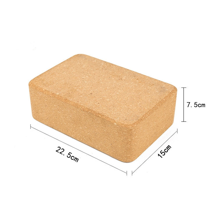 Cork yoga block measuring 22.5 x 15 x 7.5 cm, tan textured rectangular brick