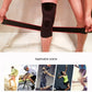 Black XL knee support guard being adjusted with red anti-slip strap