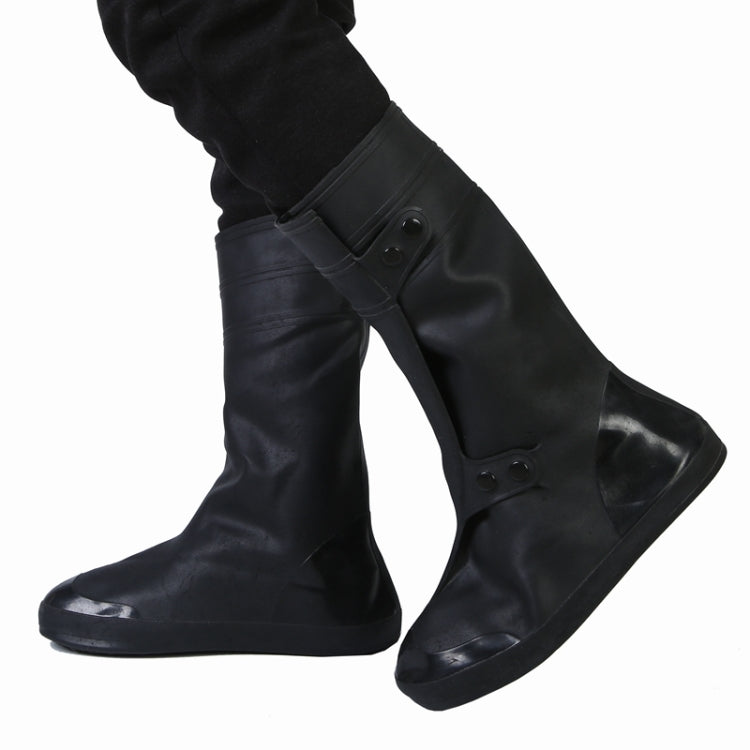 Black high tube rainproof shoe covers with snap straps for boot coverage