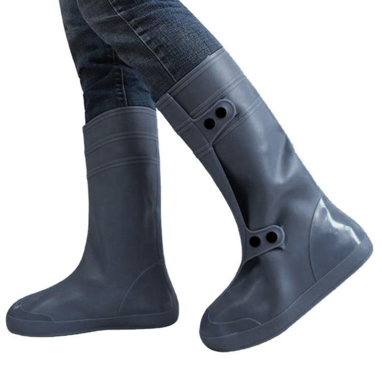 Blue high tube rainproof shoe covers on jeans, adult size XXL