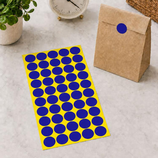 Sapphire blue round self-adhesive sticker labels sheet with blue dot circles on yellow backing