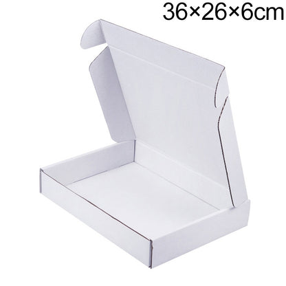 White open clothing shipping box with hinged top flaps and empty interior