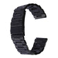 Black metal link watch band with classic buckle, open view of clasp end