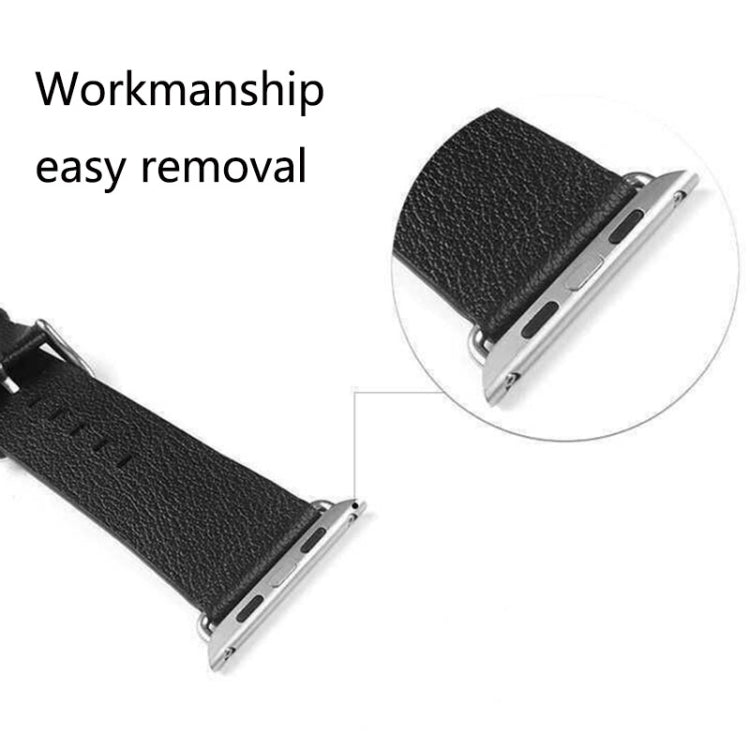 Metal strap connector clips on black band with screwdriver tool