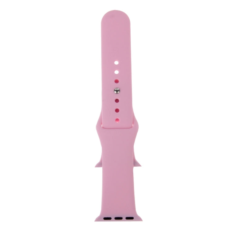 Pink rubber watch band with pin-and-tuck closure, side view with strap holes