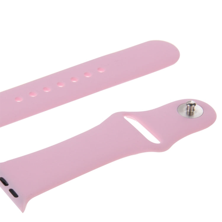 Pink rubber watch band strap with pin-and-tuck closure, adjustment holes