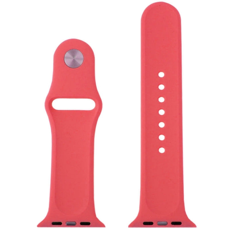 Red rubber watch band with metal pin-and-tuck keeper and ventilation hole rows