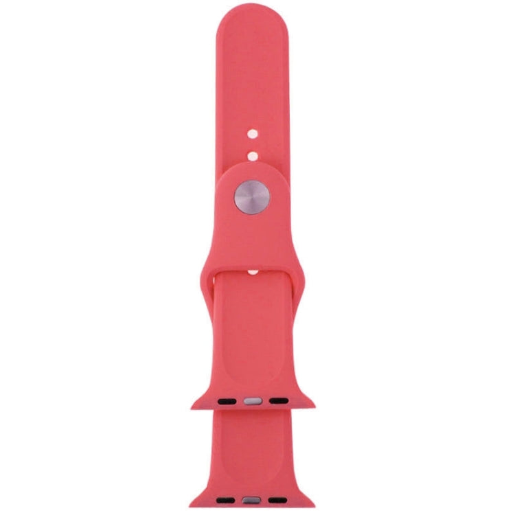 Red rubber watch band clasp with metal pin, perforation holes, and notch slots