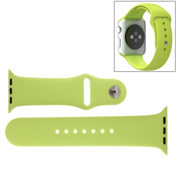 Green rubber Apple Watch sport band with pin-and-tuck closure and adjustment holes