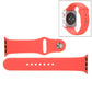 Red rubber Apple Watch band with pin-and-tuck closure, end holes and metal pin