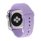 Purple rubber sport watch band with pin-and-tuck closure shown on Apple Watch